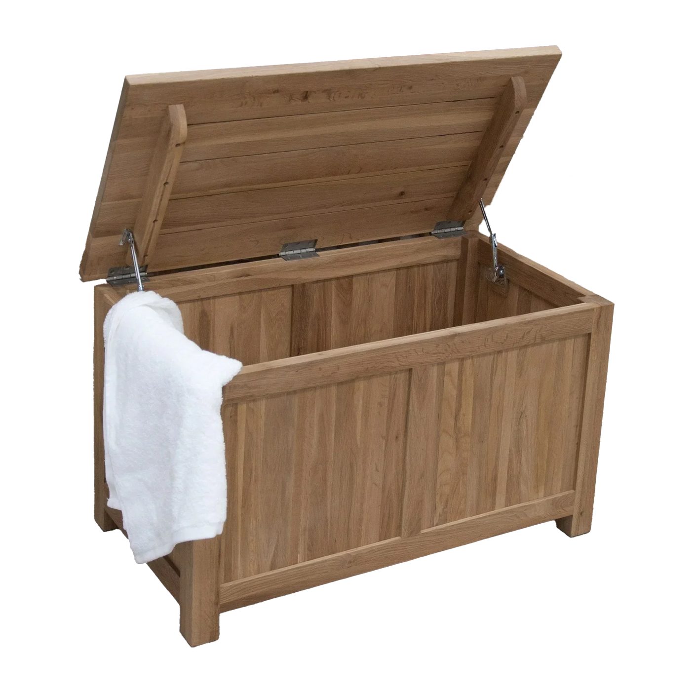 Oak storage chest with hinged lid open and white towel draped over the side
