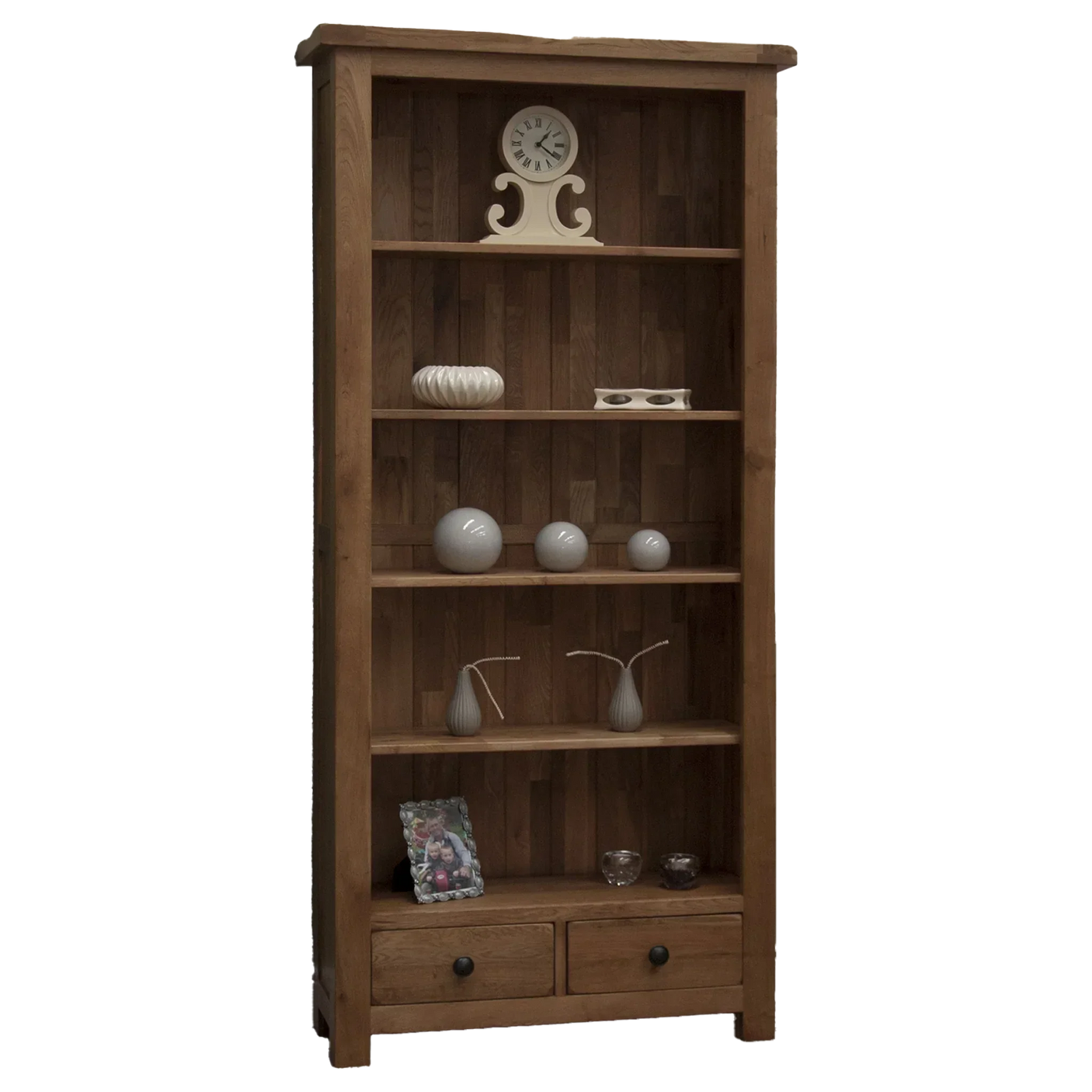 Oak bookcase with shelves, two drawers, and decorative accessories displayed