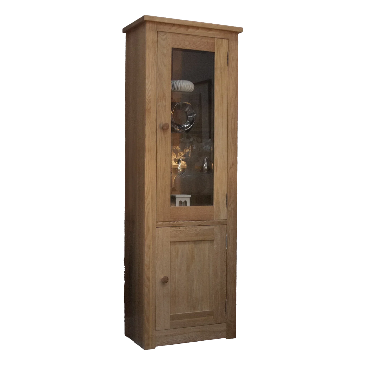Tall oak display cabinet with glass door and wooden lower cupboard, shown at an angle