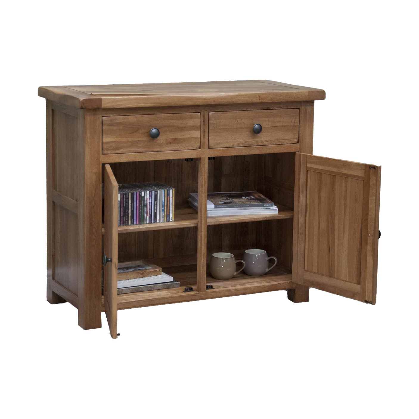Oak sideboard cabinet with two drawers, open doors, shelves holding mugs, books, and CDs
