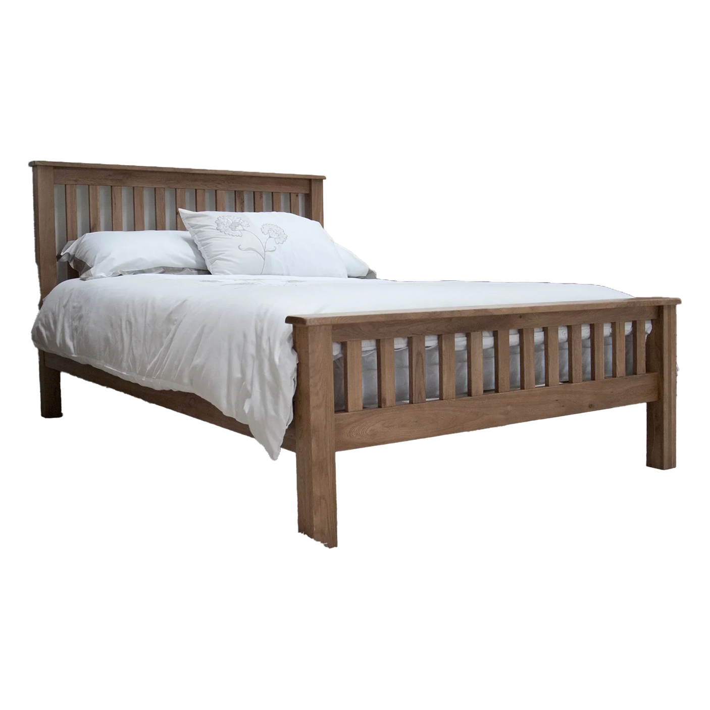 Oak wooden bed frame with slatted headboard and footboard, dressed with white bedding