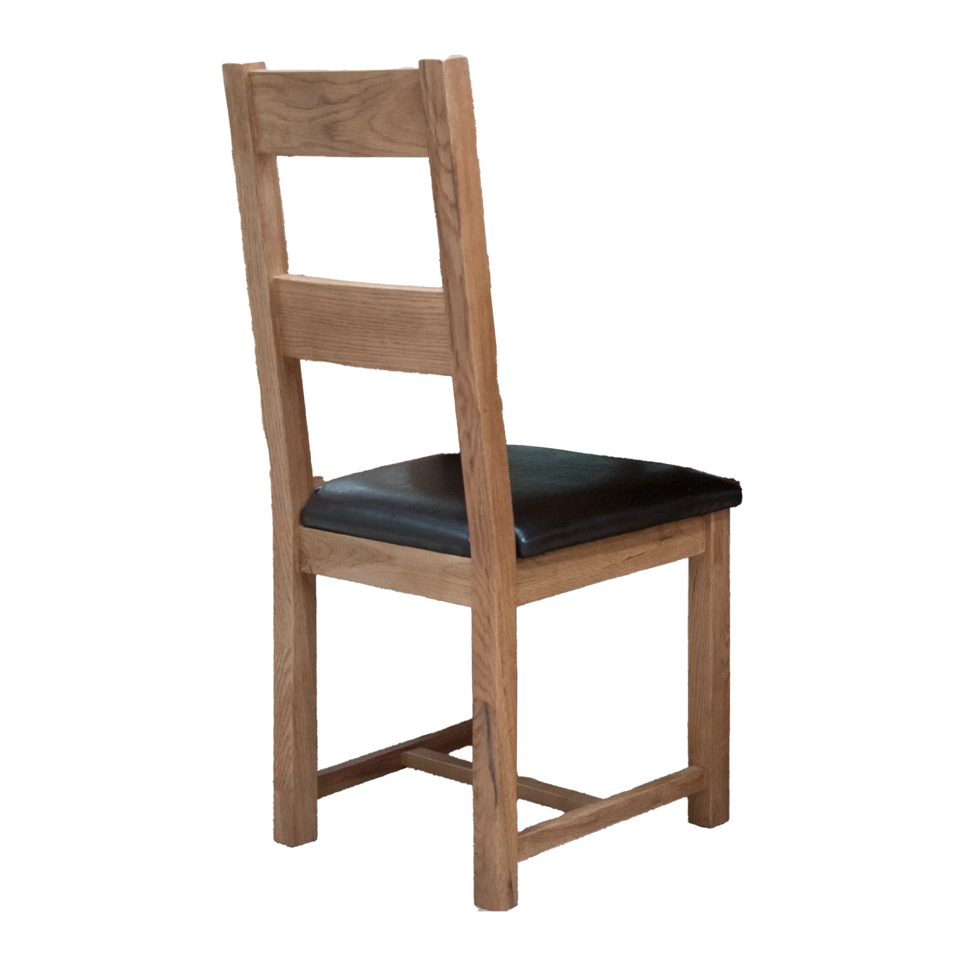 Oak dining chair with dark padded seat and ladder back, side angle view