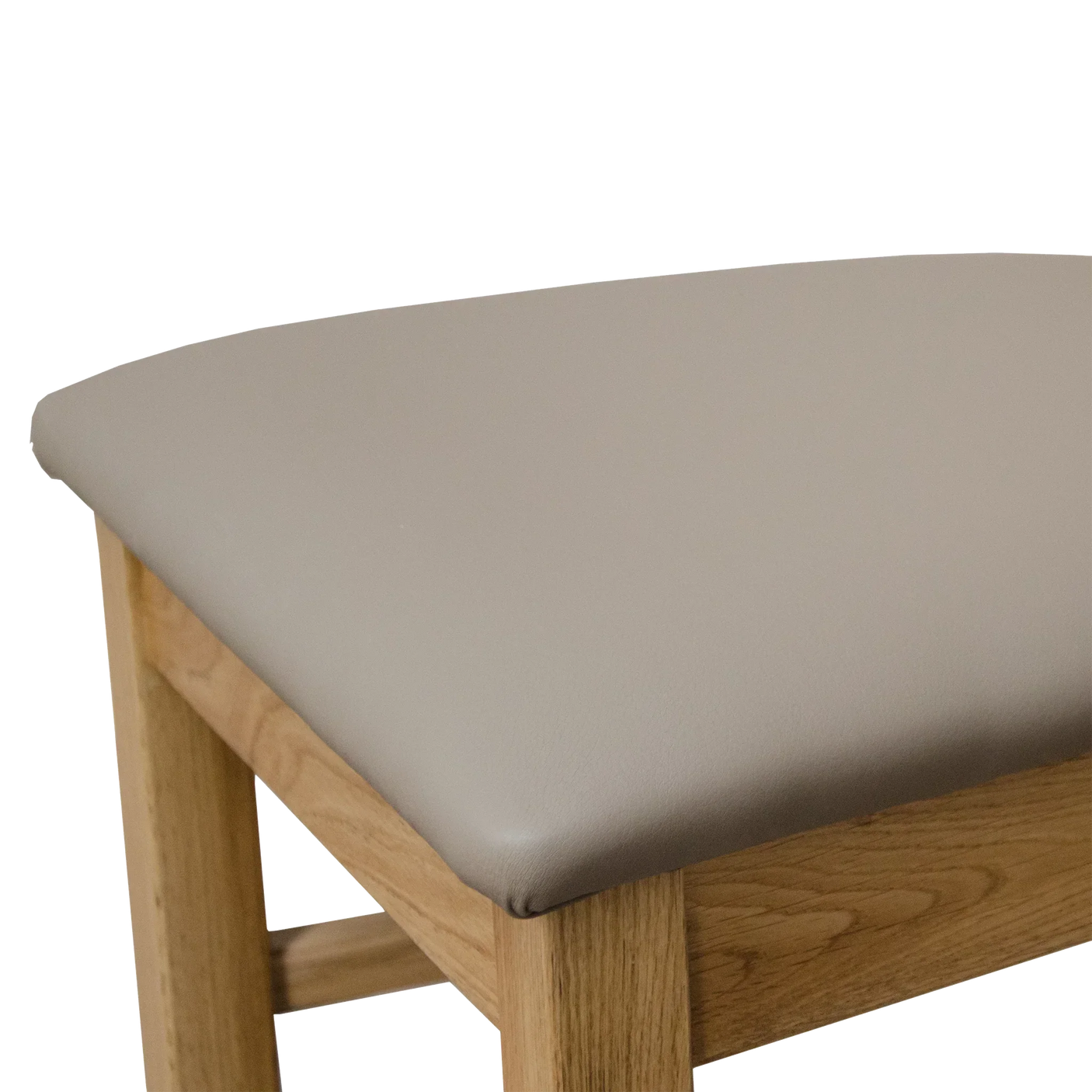 Oak dining chair with light grey padded seat cushion close-up
