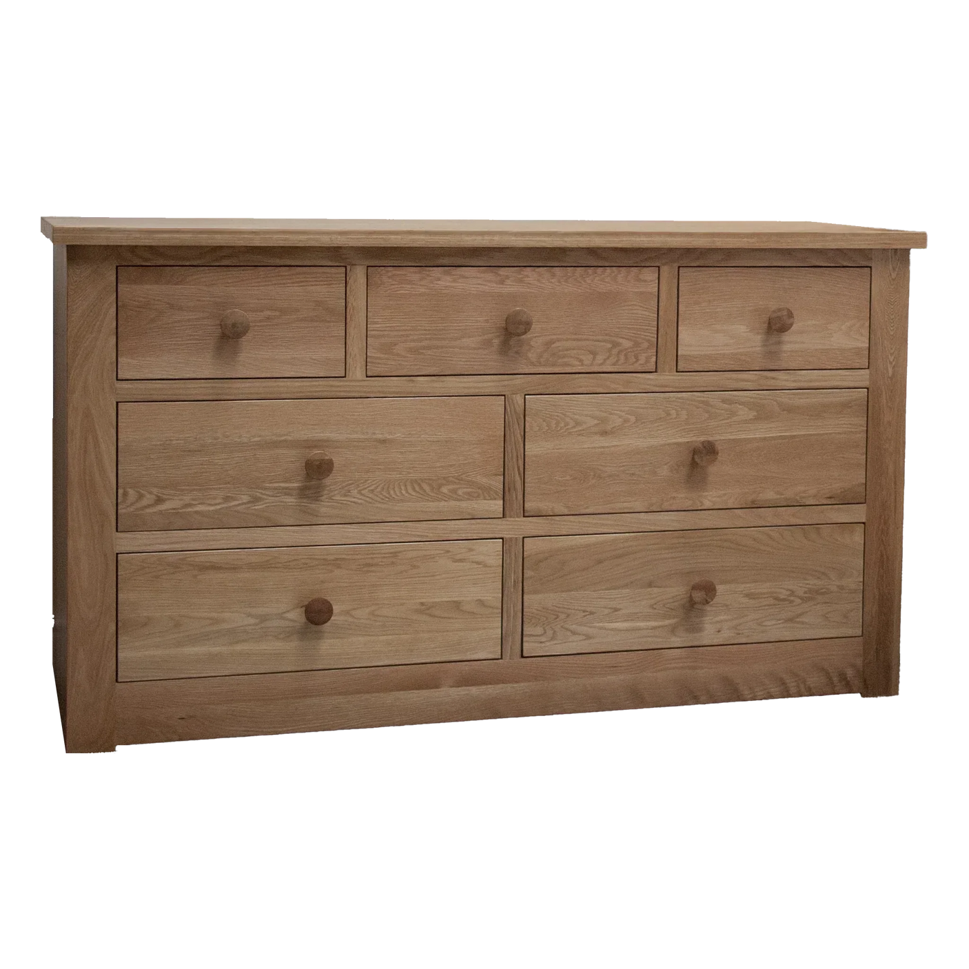 oak chest of drawers with seven wooden handles and natural wood grain finish