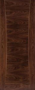 Walnut wood internal door with curved panel detailing and smooth finish