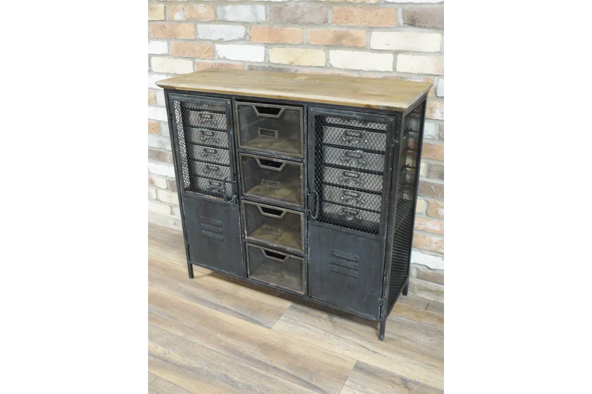 Industrial storage cabinet with black metal mesh doors and wood top on wooden floor
