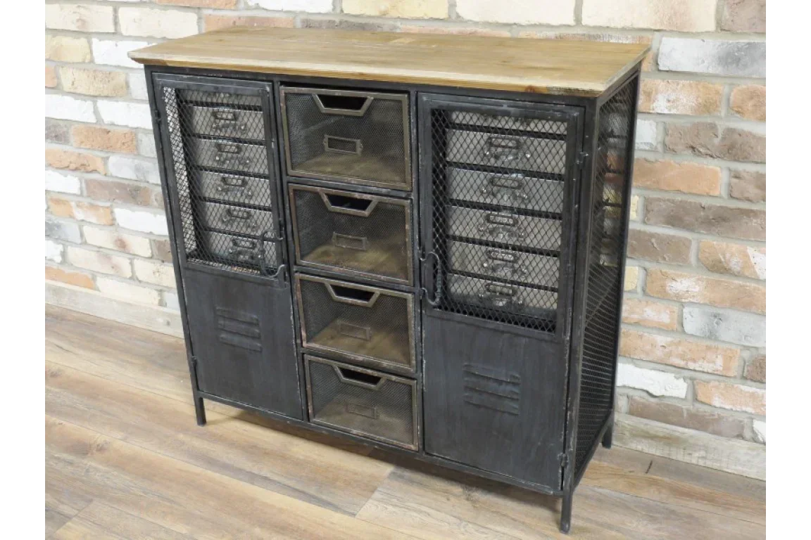 Industrial sideboard with mesh metal drawers and wood top against brick wall