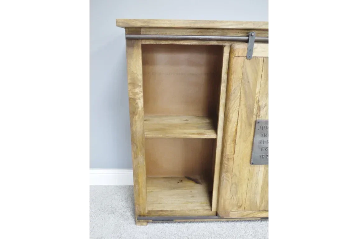 Closeup of wooden sideboard shelving with sliding door and natural grain finish