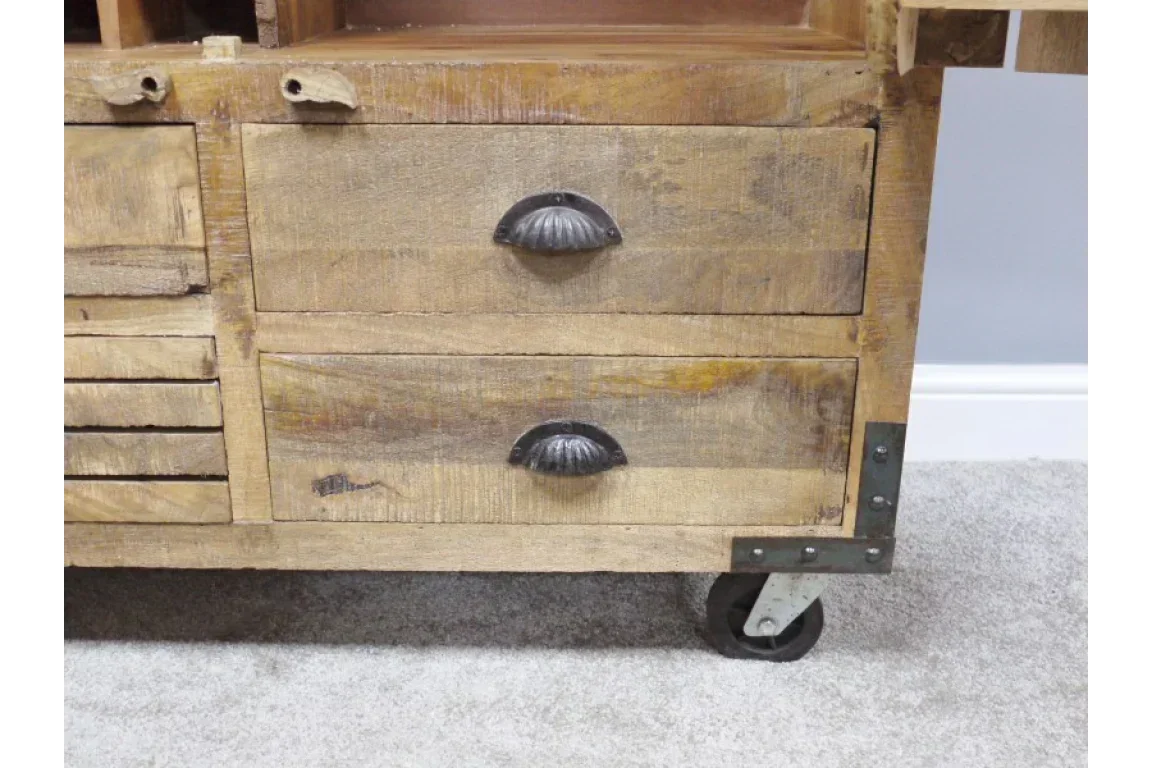 Wooden storage cabinet with two drawers, black shell handles, and metal caster wheels