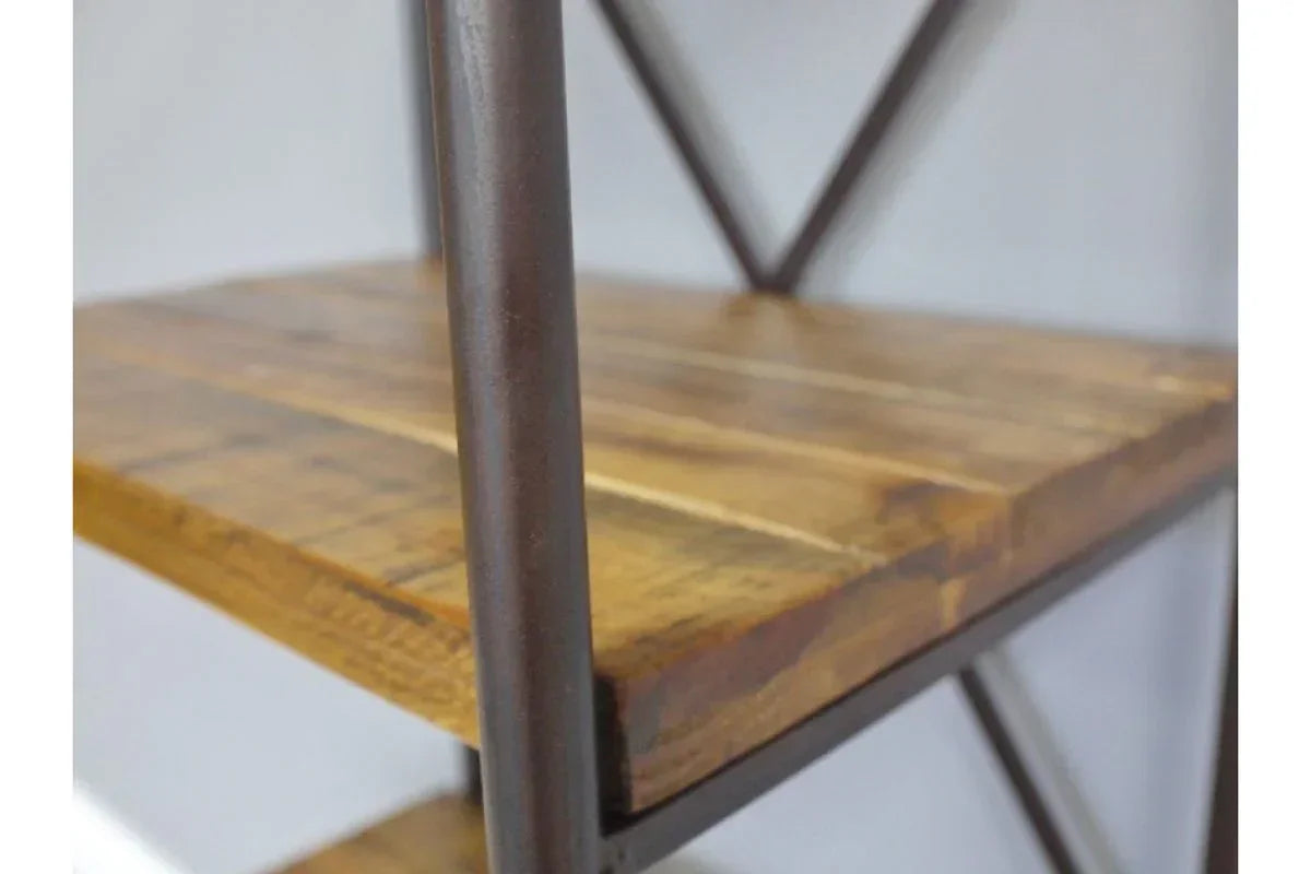 Closeup of industrial shelving unit with wooden shelf and black metal frame