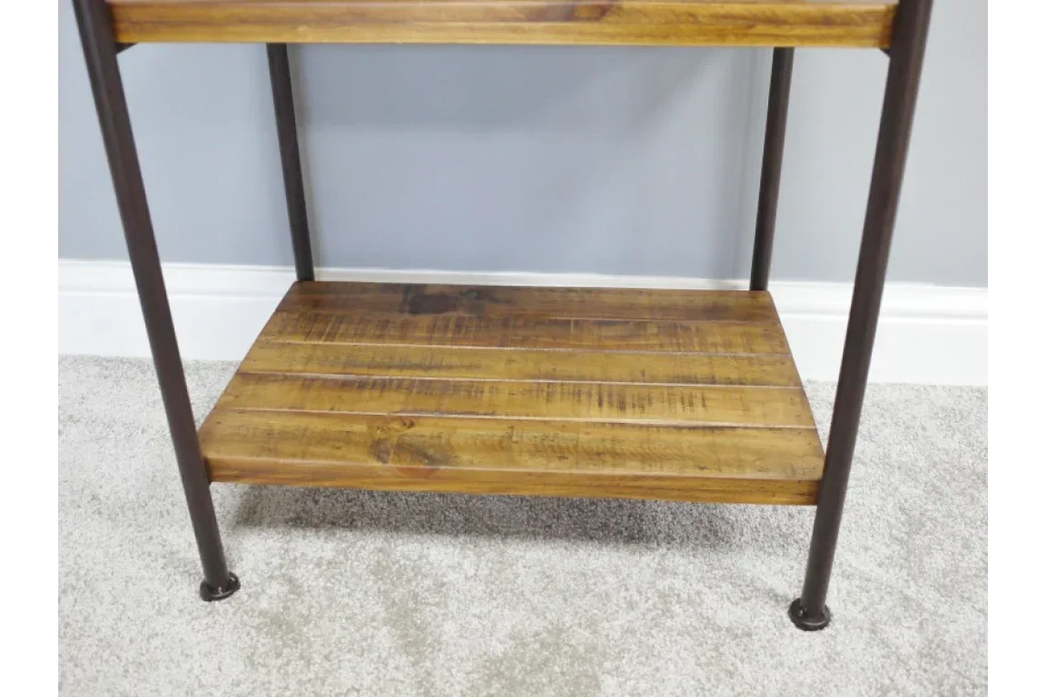 Closeup of wooden shelf with metal frame on carpet, industrial style furniture