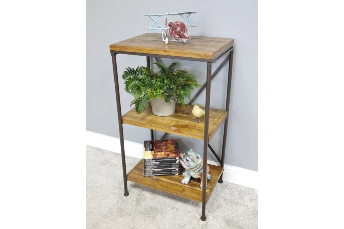 Three tier industrial shelf with wood shelves and metal frame, decorated with books and plants