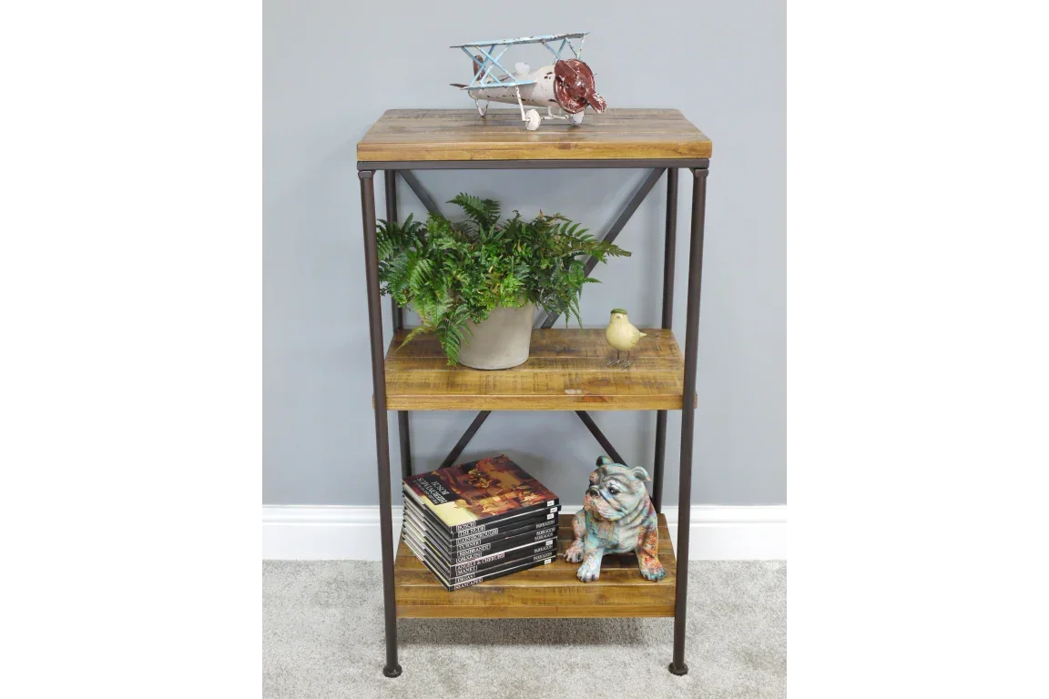 Three tier industrial shelving unit with wooden shelves, metal frame, decor and books displayed