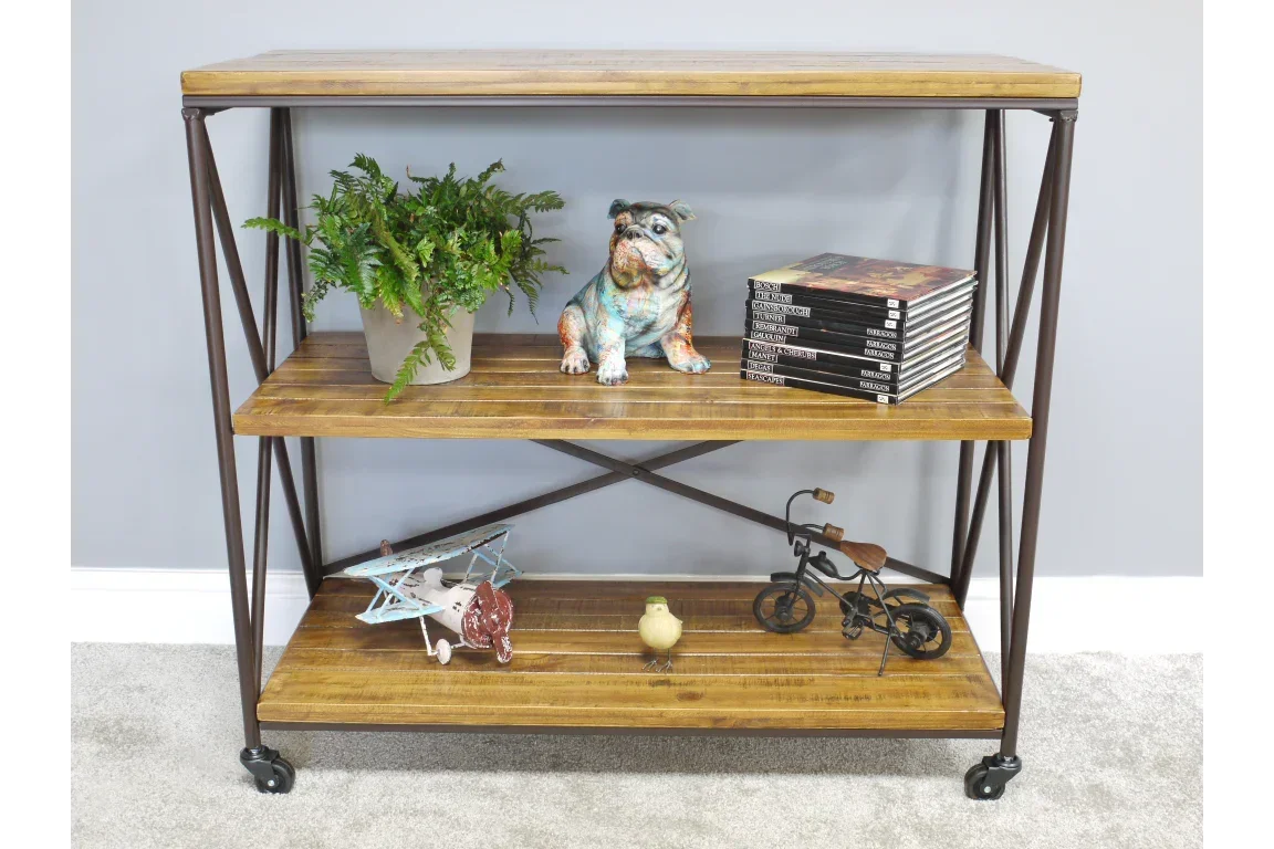 Industrial style wooden shelving unit with metal frame and display decor on three tiers