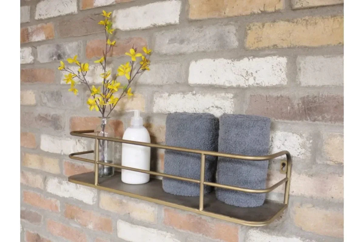 Wall mounted metal shelf with grey towels, soap dispenser and yellow flowers