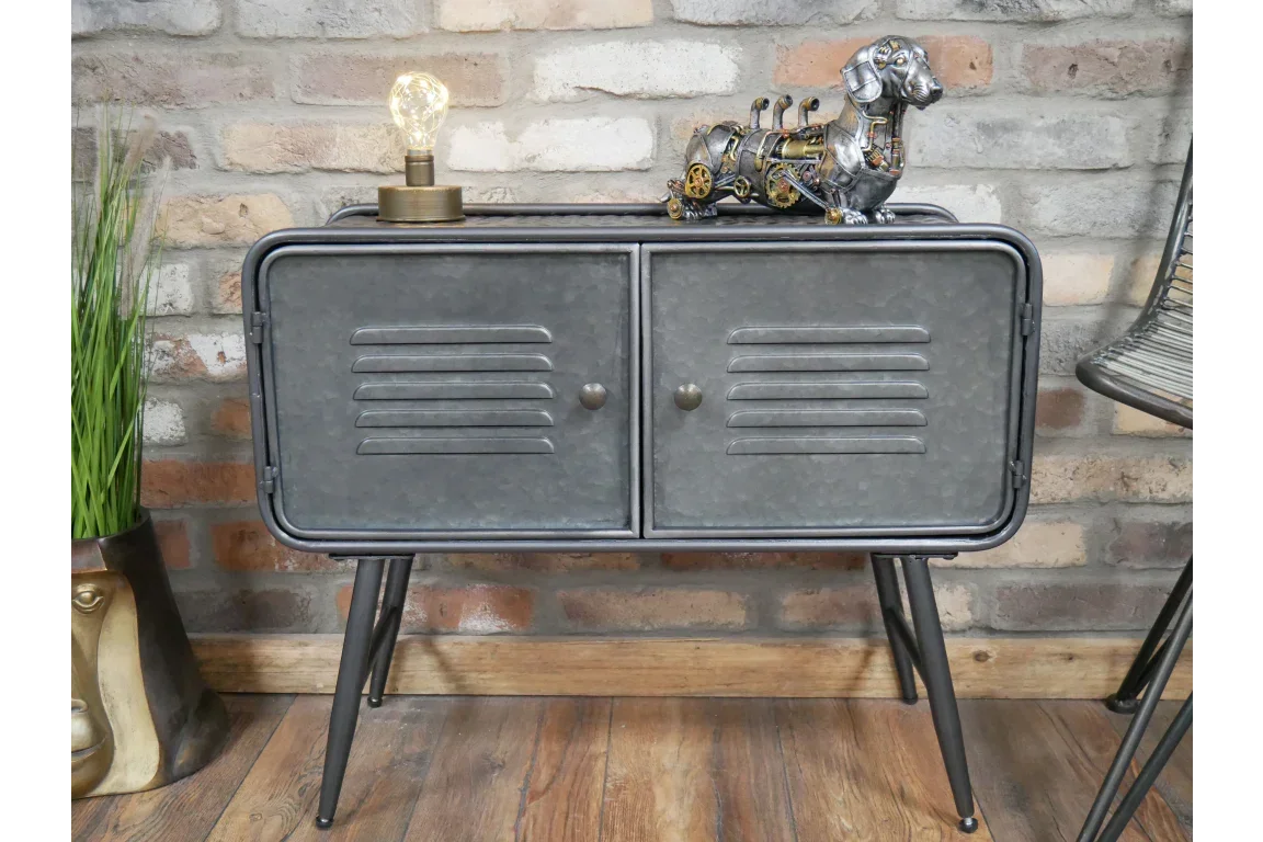 Industrial metal sideboard with two louvered doors, lamp, and dog ornament on top