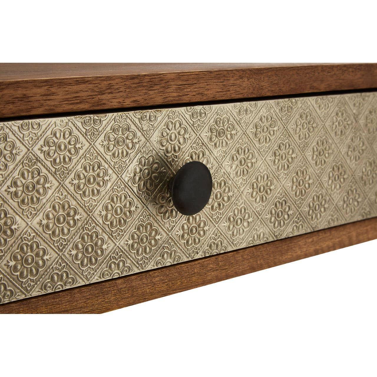 Wooden drawer with embossed metal front and round black handle, floral geometric pattern