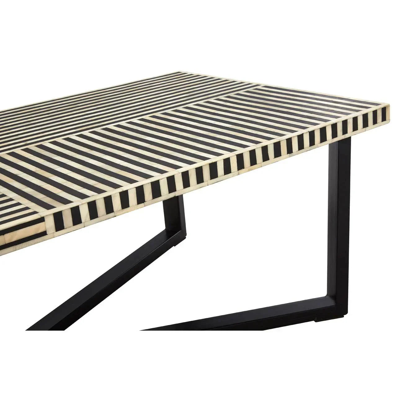 Striped dining table with black metal legs and monochrome geometric inlay top