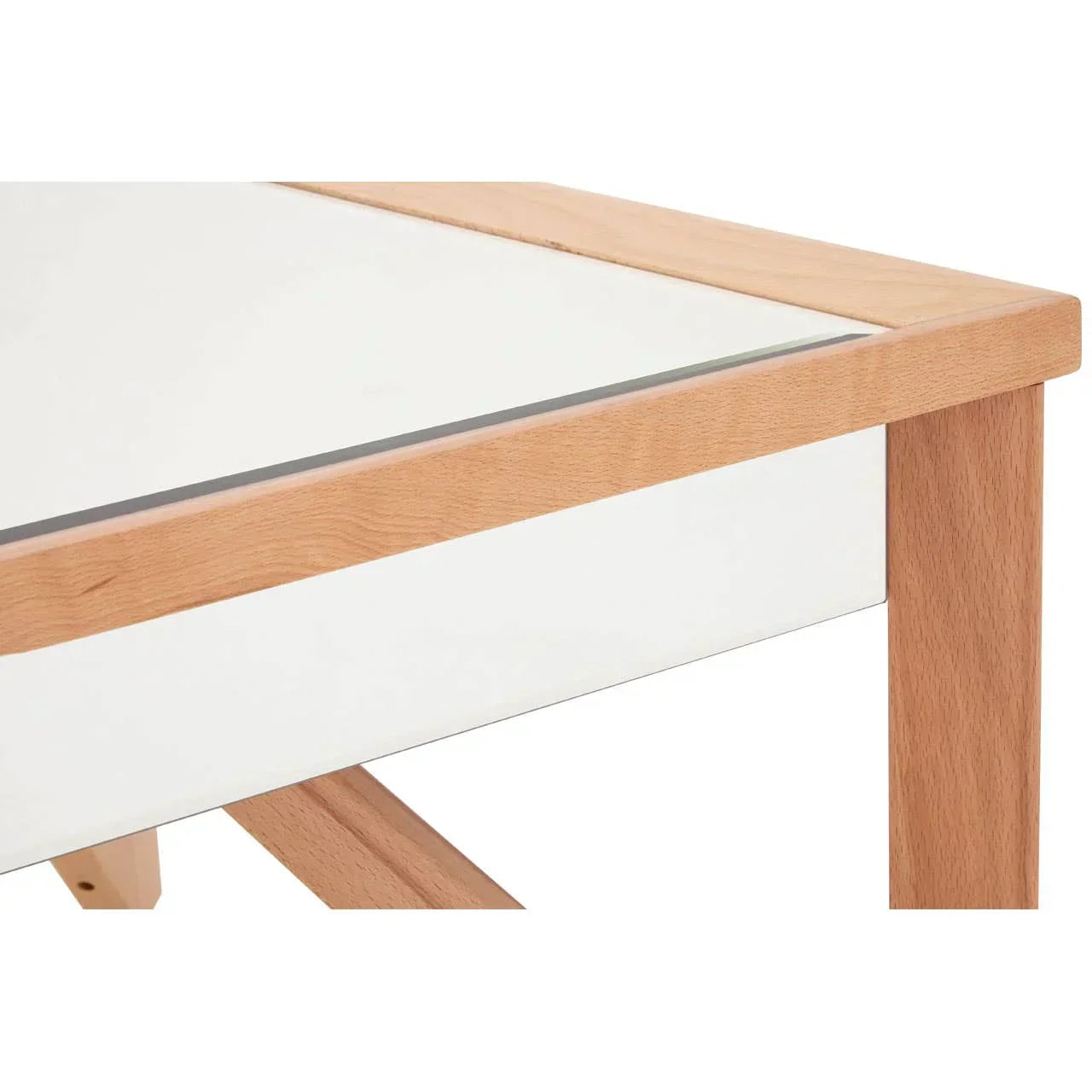 Closeup of wooden dining table corner with white tabletop and natural wood legs