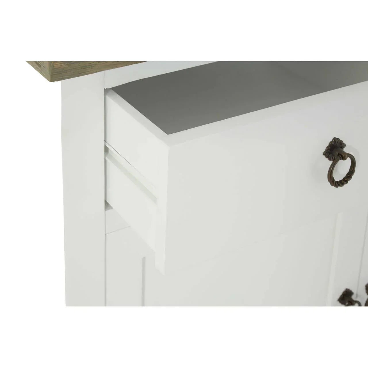 White wooden sideboard drawer with metal ring handle, close view of open storage compartment