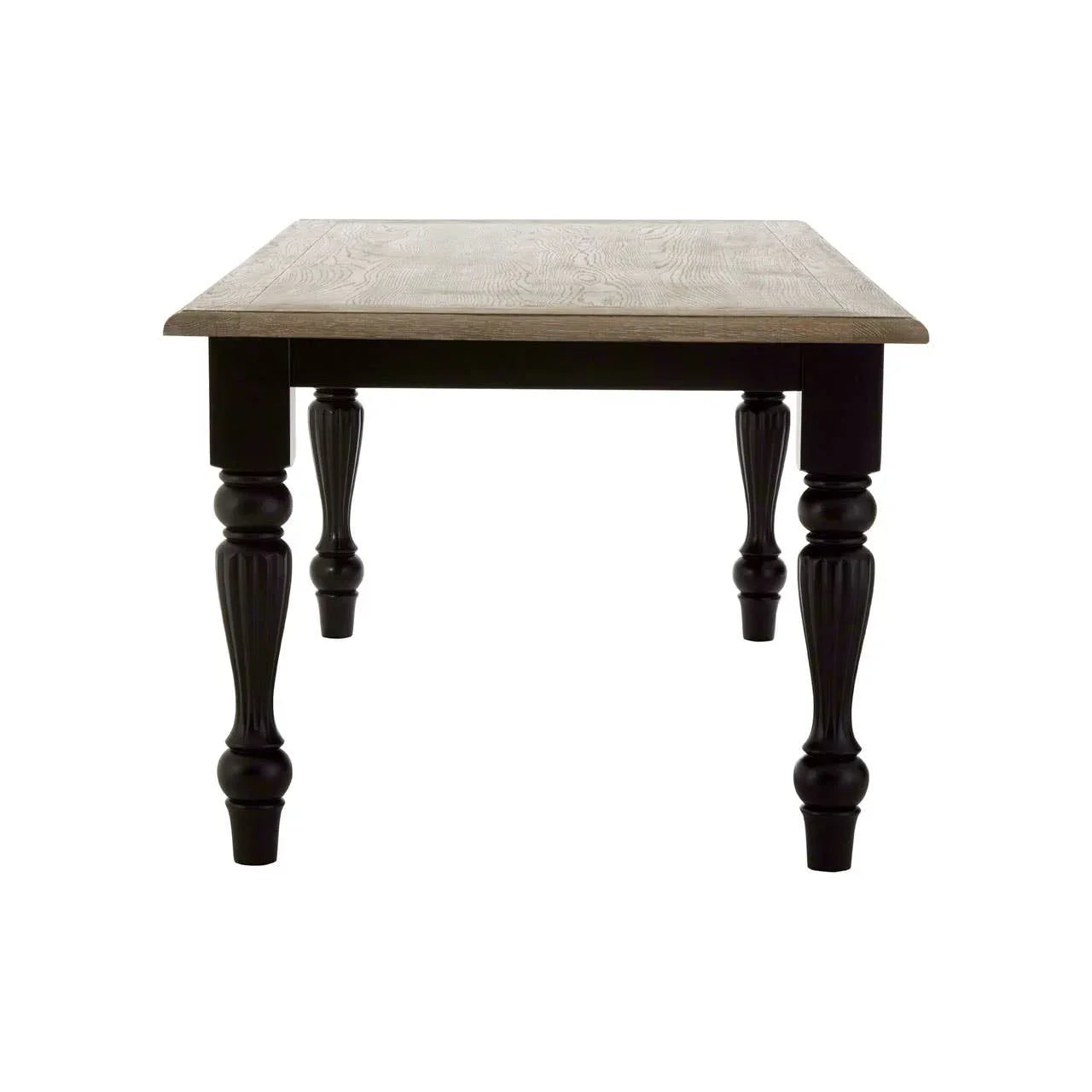 Rectangular wooden dining table with carved black legs and natural finish top, front view