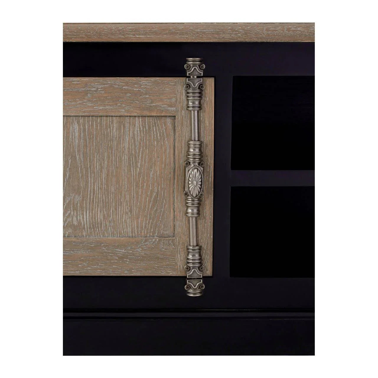 Wooden cabinet door with ornate metal handle and black shelving detail