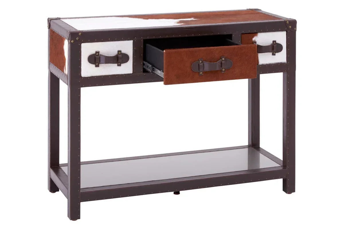 Brown and white console table with cowhide finish, metal frame and three drawers, one open