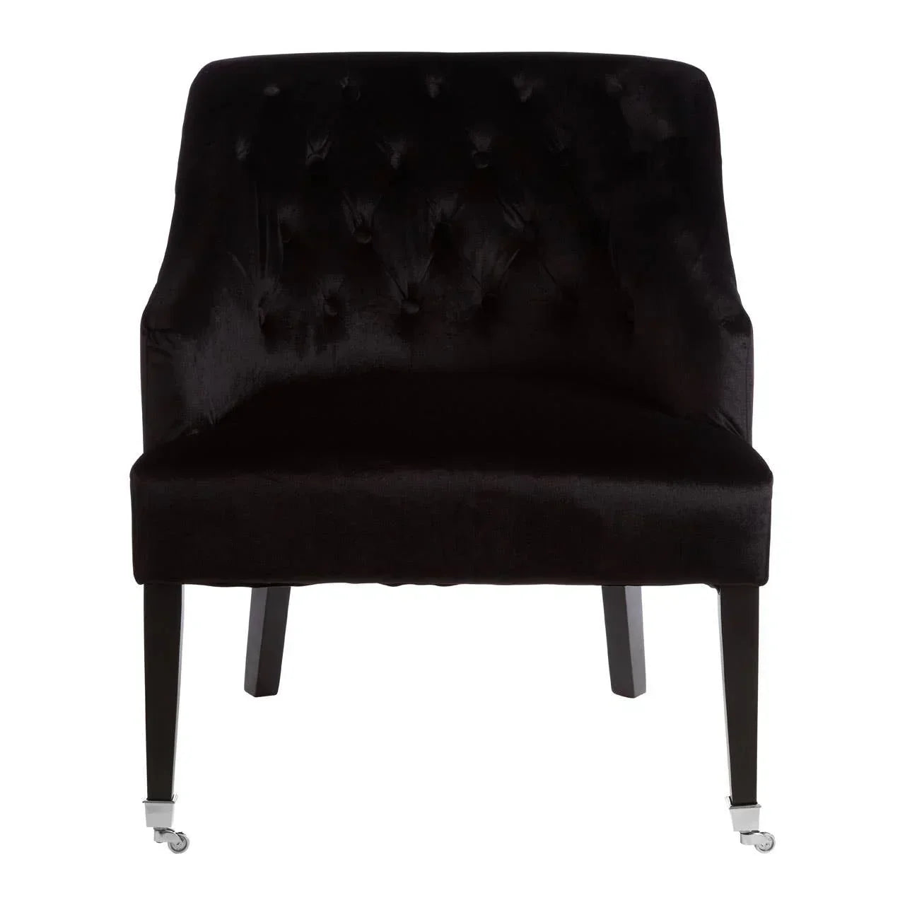 Black velvet accent chair with tufted backrest and front legs on castor wheels
