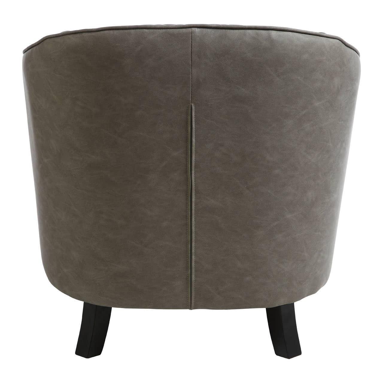 Back view of grey leather accent chair with curved design and black wooden legs