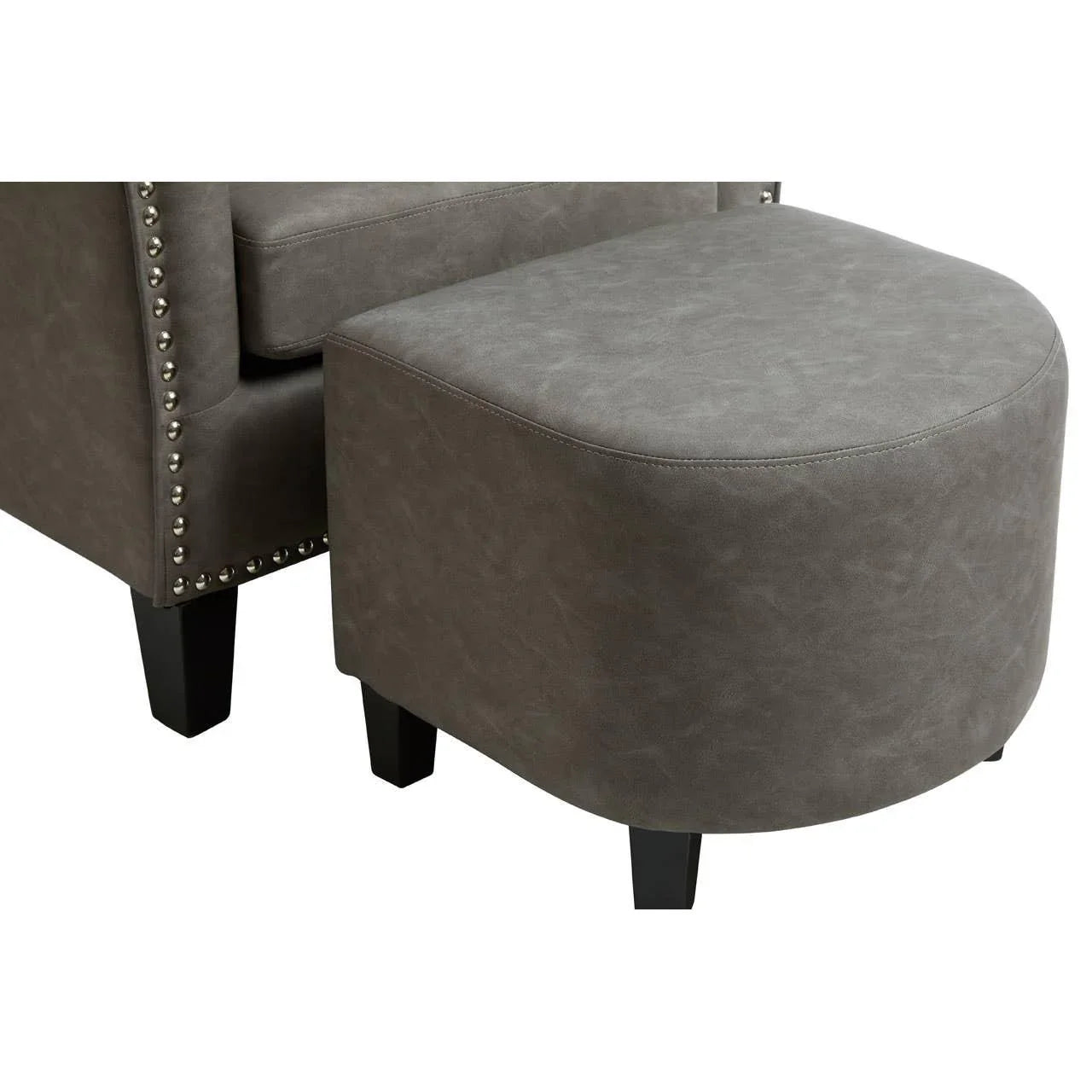 Grey faux leather ottoman with studded armchair detail and black wooden legs