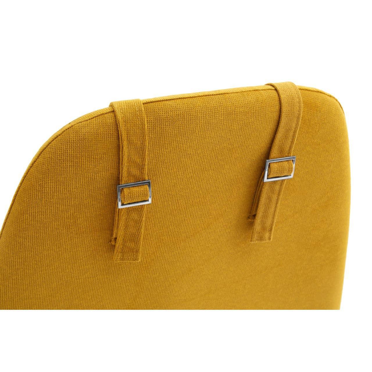 Mustard yellow fabric dining chair backrest with adjustable buckle straps detail