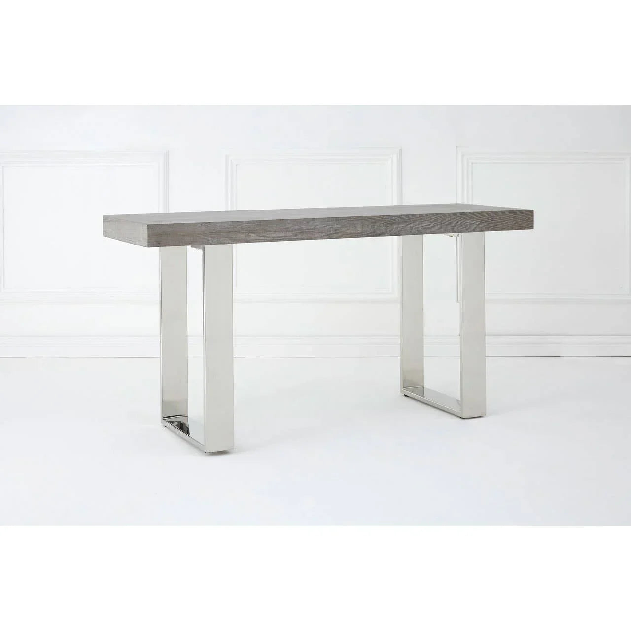 Modern console table with grey wood top and chrome metal legs against white background