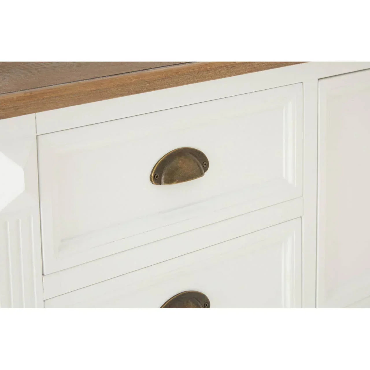 White wooden drawer cabinet with brass cup handles and natural oak top
