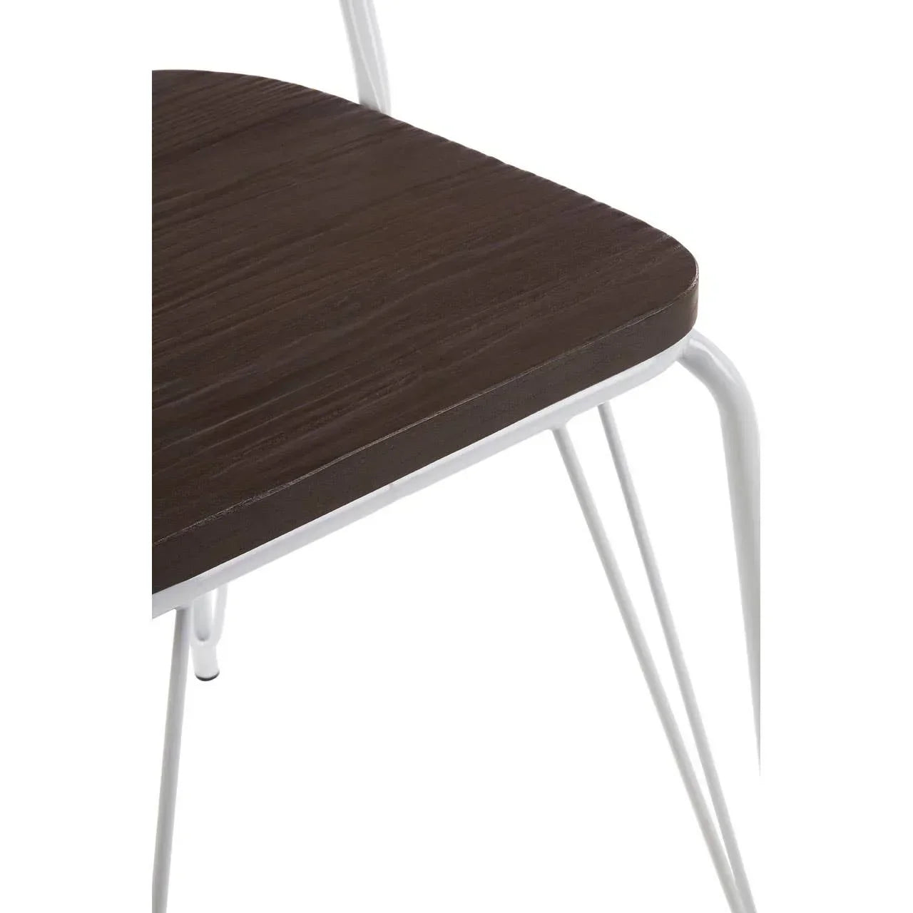 Dark wood dining chair seat with white metal legs, close-up of corner and frame