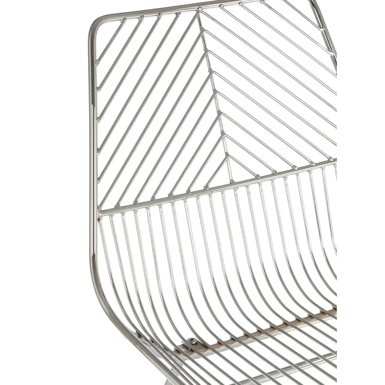 Chrome metal dining chair frame with chevron pattern backrest, close-up angle