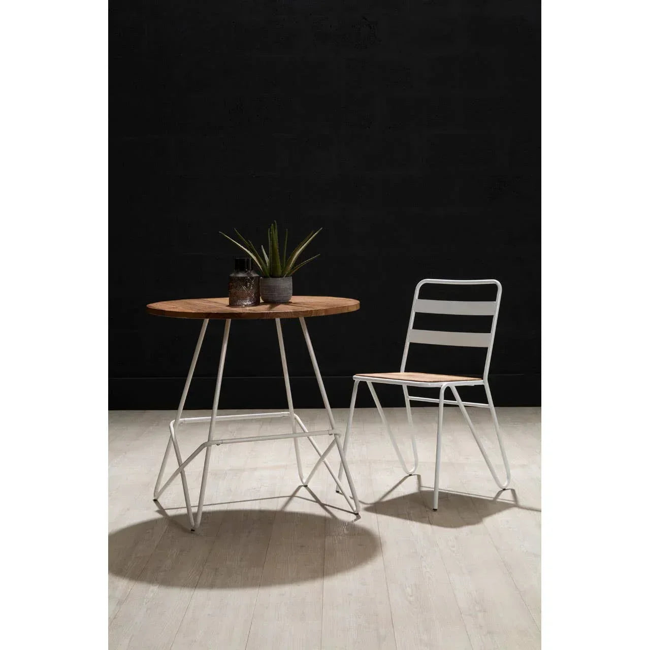 Modern dining table set with round wood top, white metal frame and matching chair