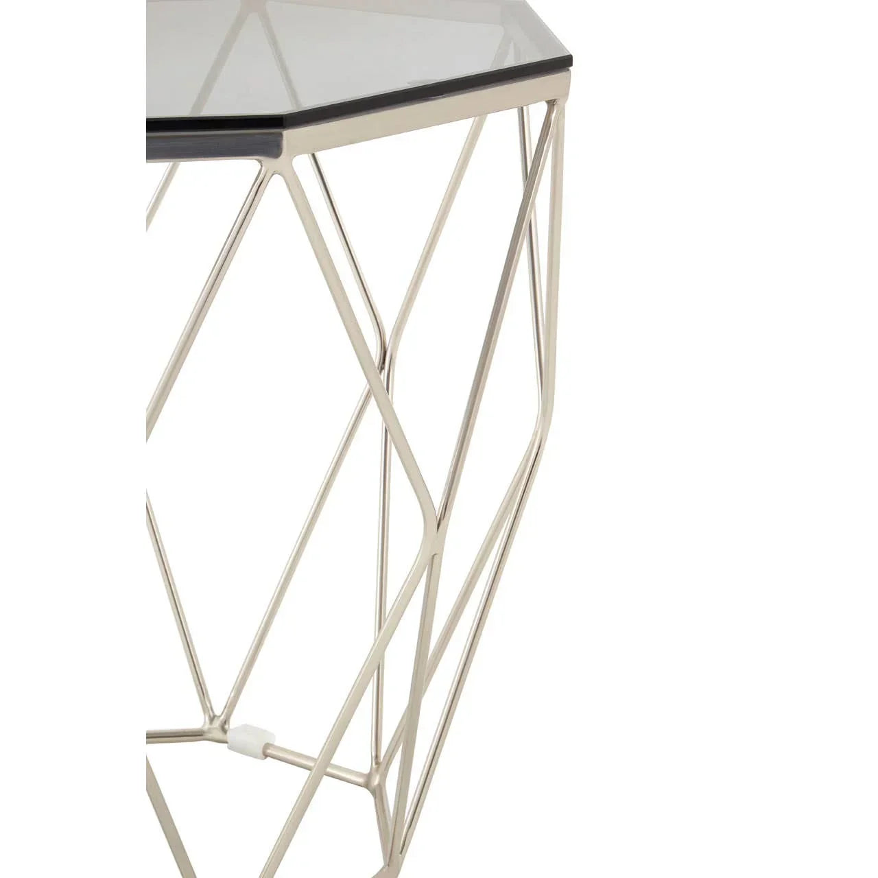 Modern glass side table with geometric chrome metal frame, close-up corner view