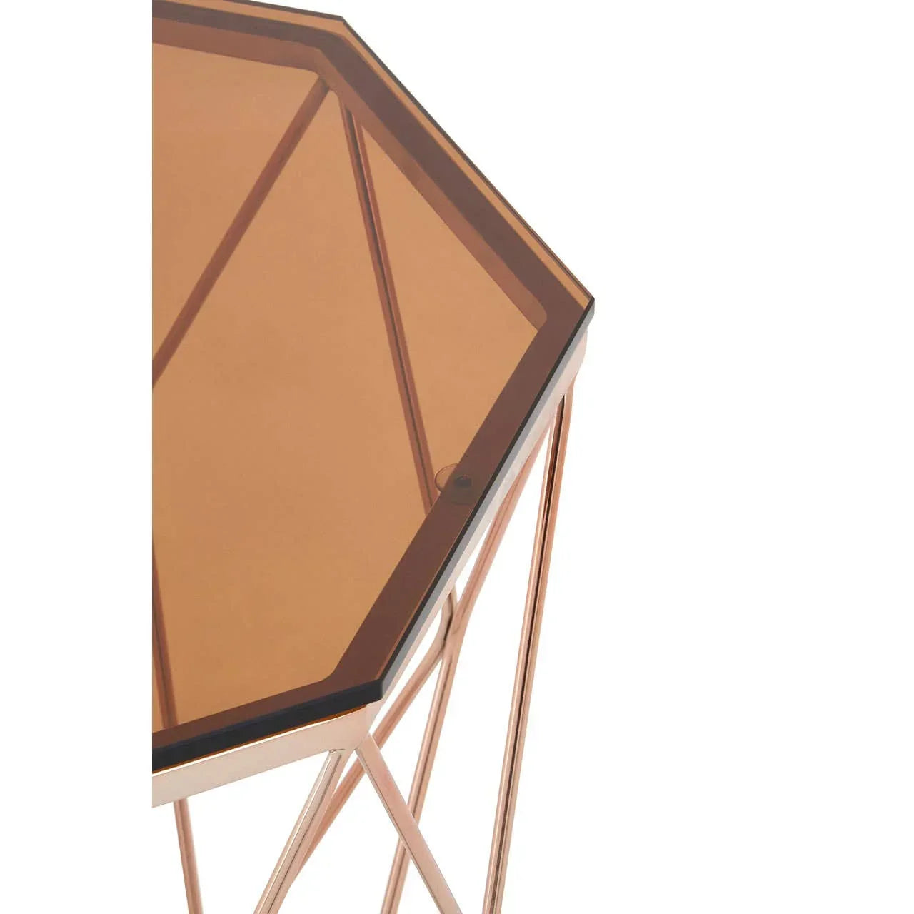 Geometric side table with brown tinted glass top and metallic frame, partial close-up view