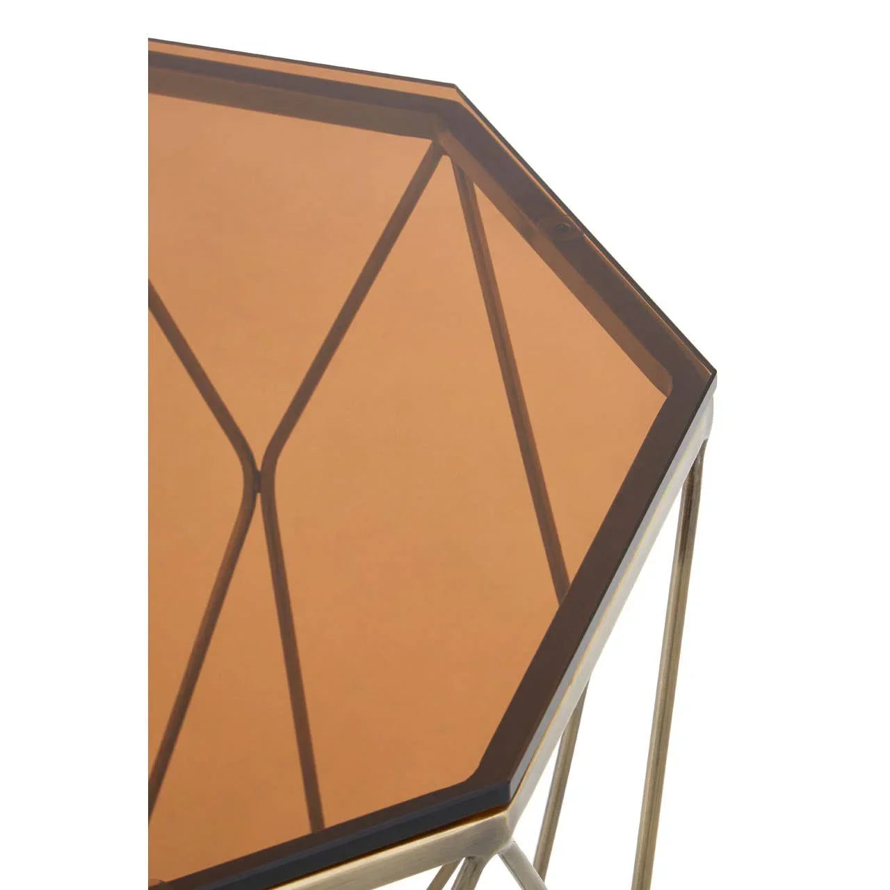 Geometric amber glass side table with metal frame, angled close-up of tabletop