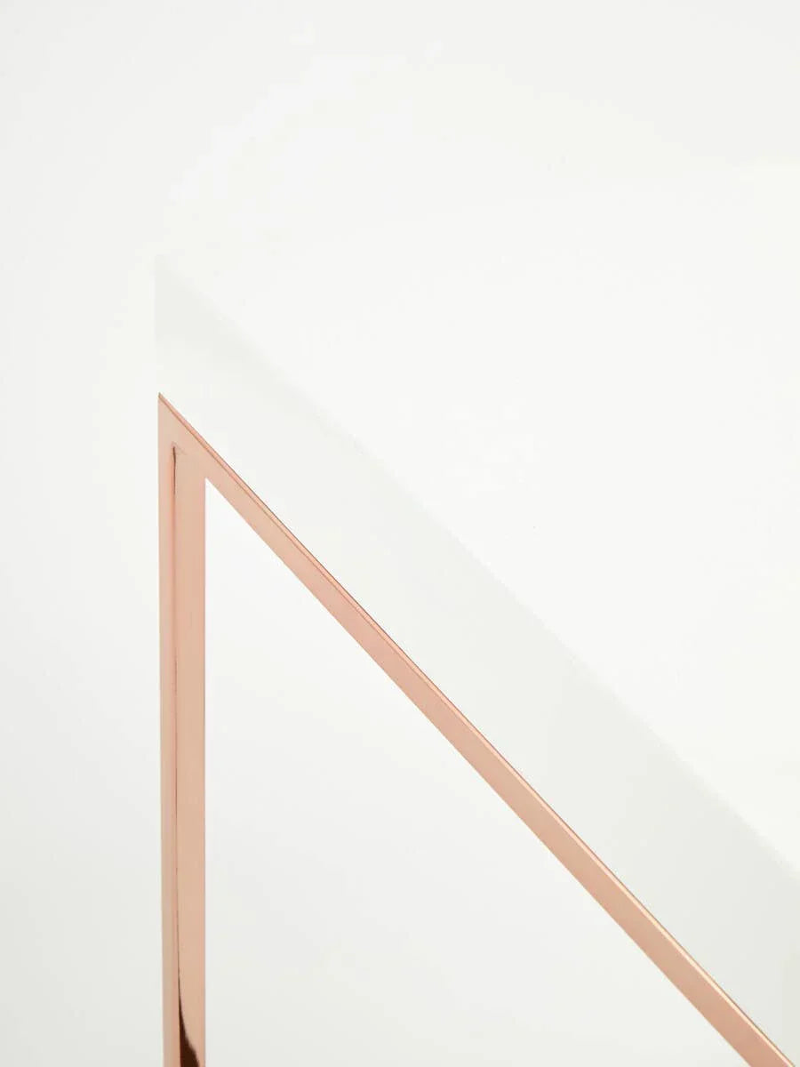 White table top with rose gold metal frame corner detail