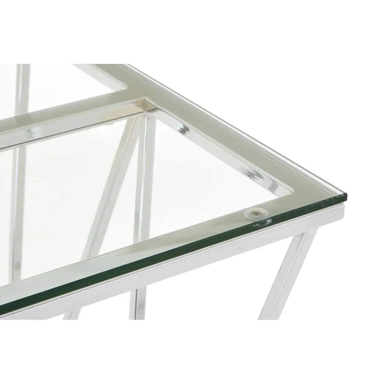 Glass coffee table with chrome metal frame, corner close-up view