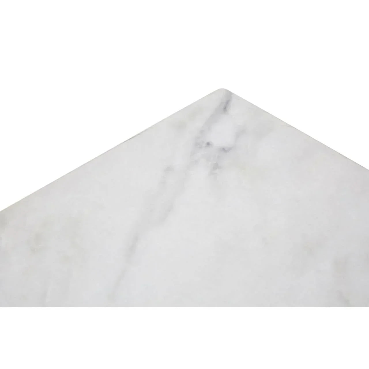 Corner detail of white marble tabletop with subtle grey veining