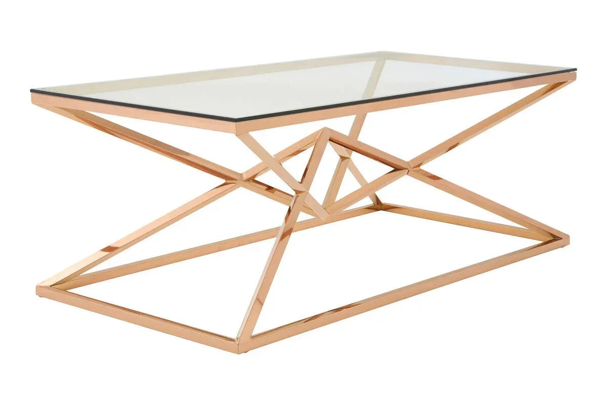 Glass top coffee table with gold geometric metal frame, angled side view
