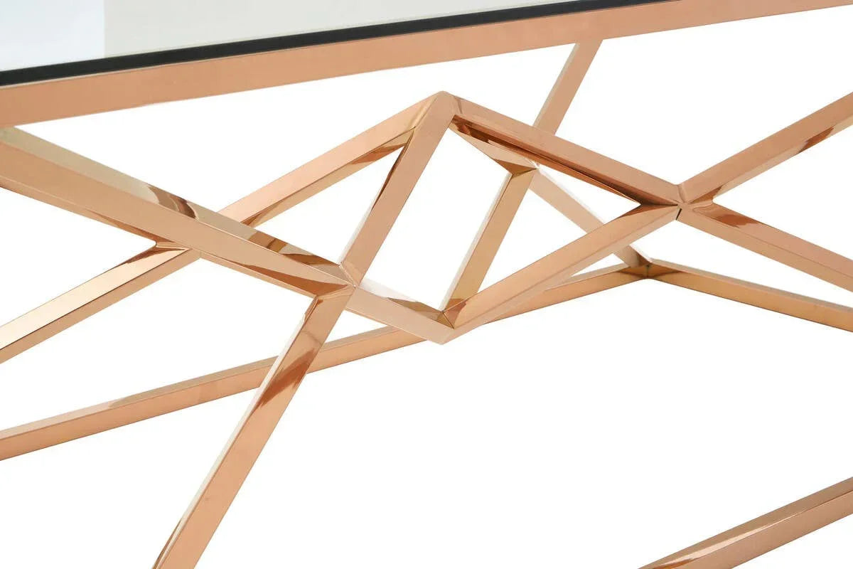 Rose gold geometric metal table base with glass tabletop detail