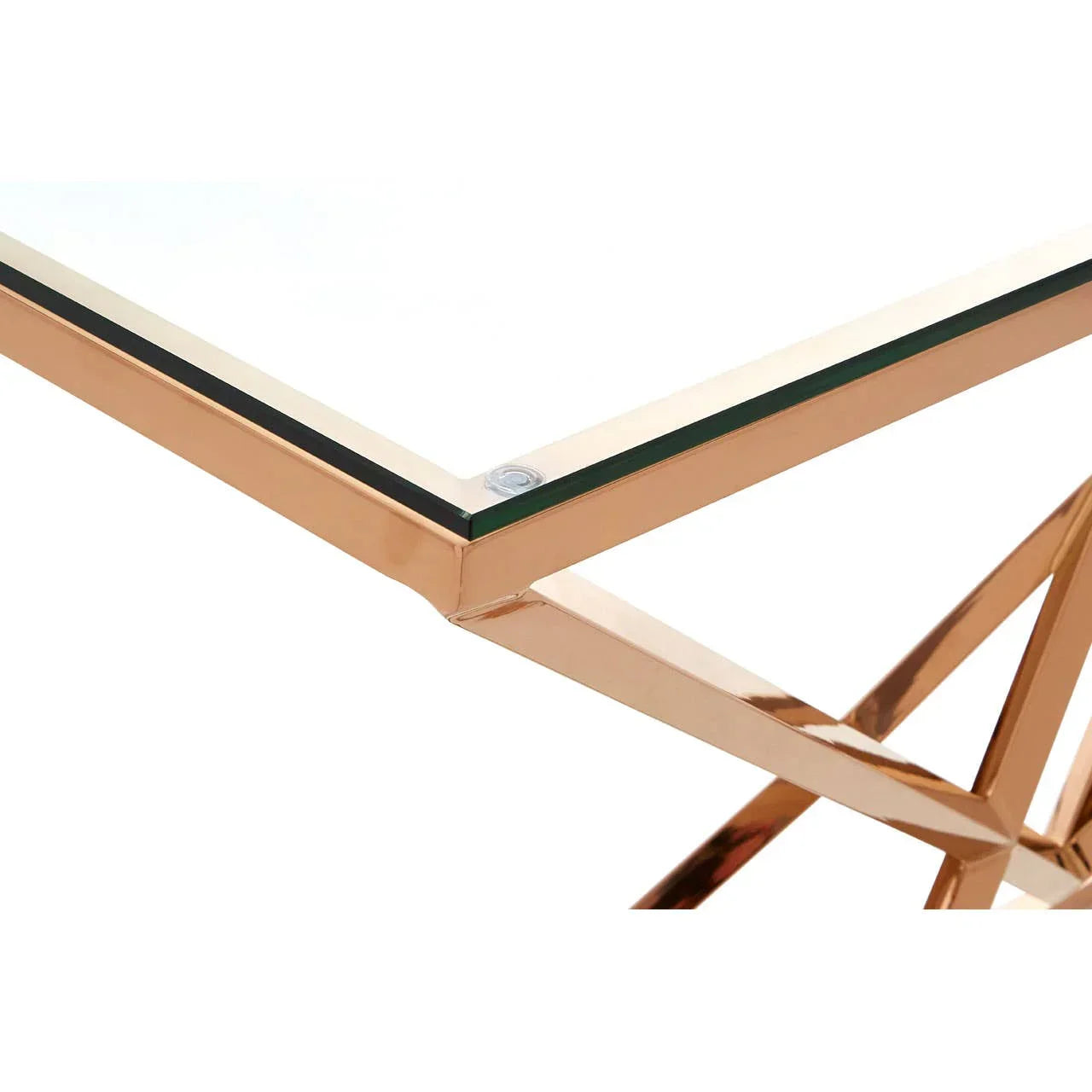 Glass coffee table with gold metal frame corner and modern geometric base detail