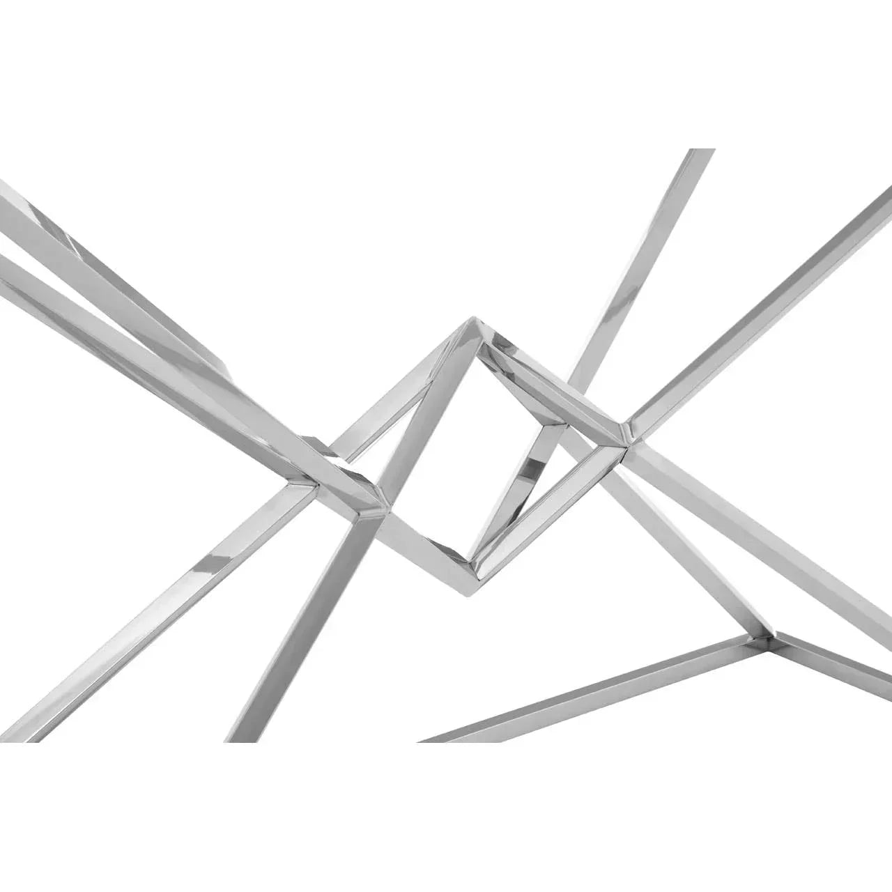 Close-up of polished metal coffee table legs with geometric intersecting design