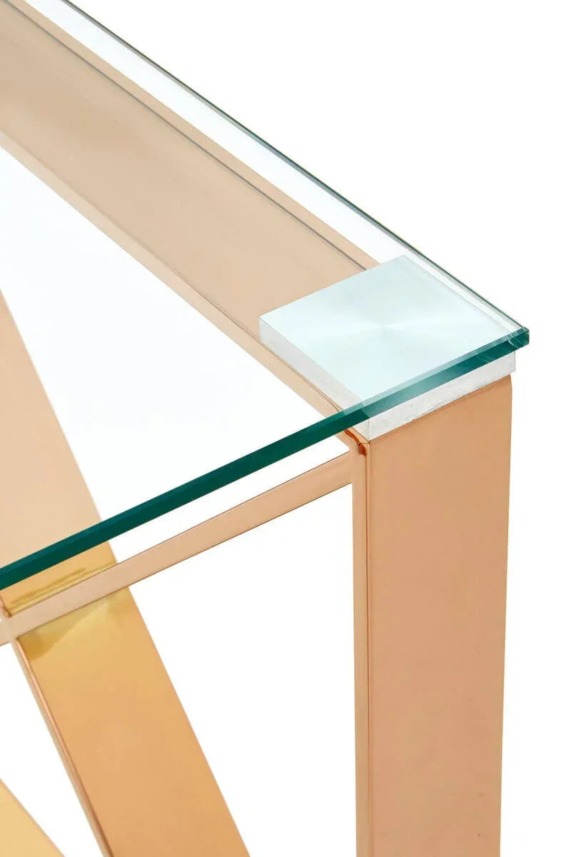 Glass console table with gold metal frame, close-up of corner design and materials