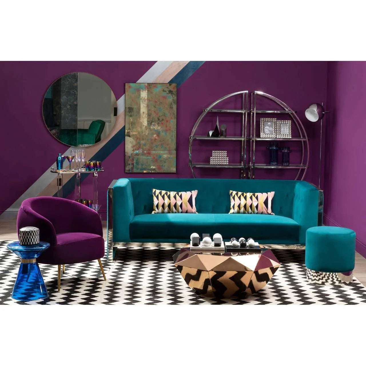 Teal velvet sofa with geometric cushions in modern living room with purple walls and gold coffee table