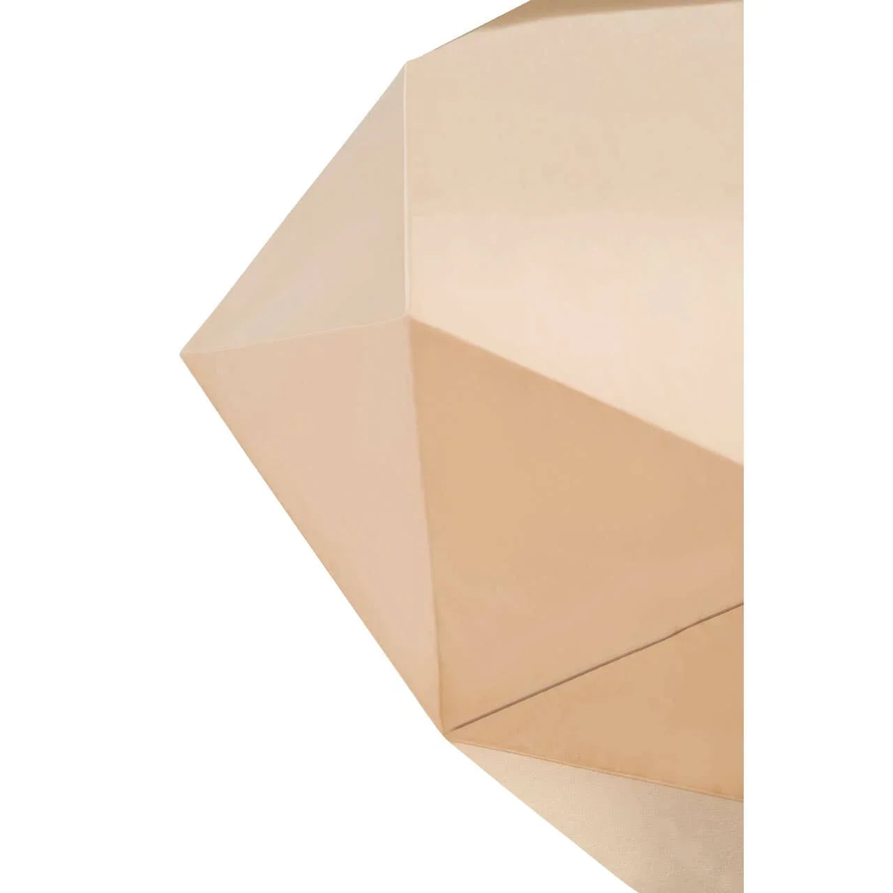 Geometric gold metal accent table close up showing faceted surface texture