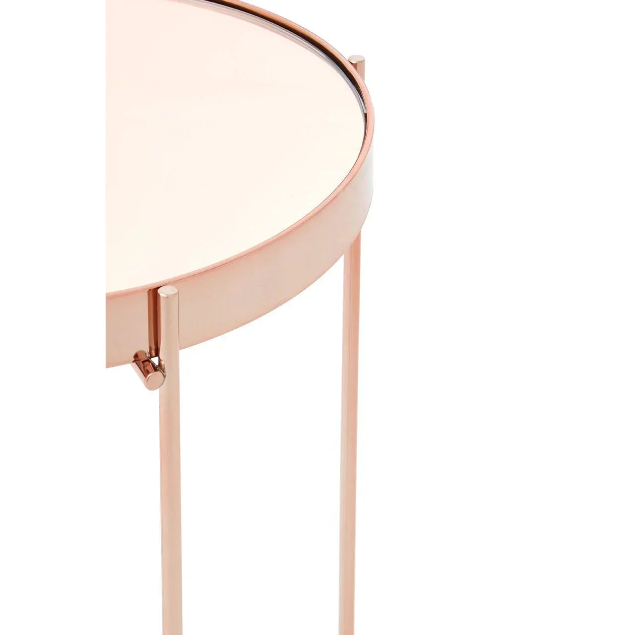 Rose gold metal side table with mirrored glass top and slim legs, partial close-up view